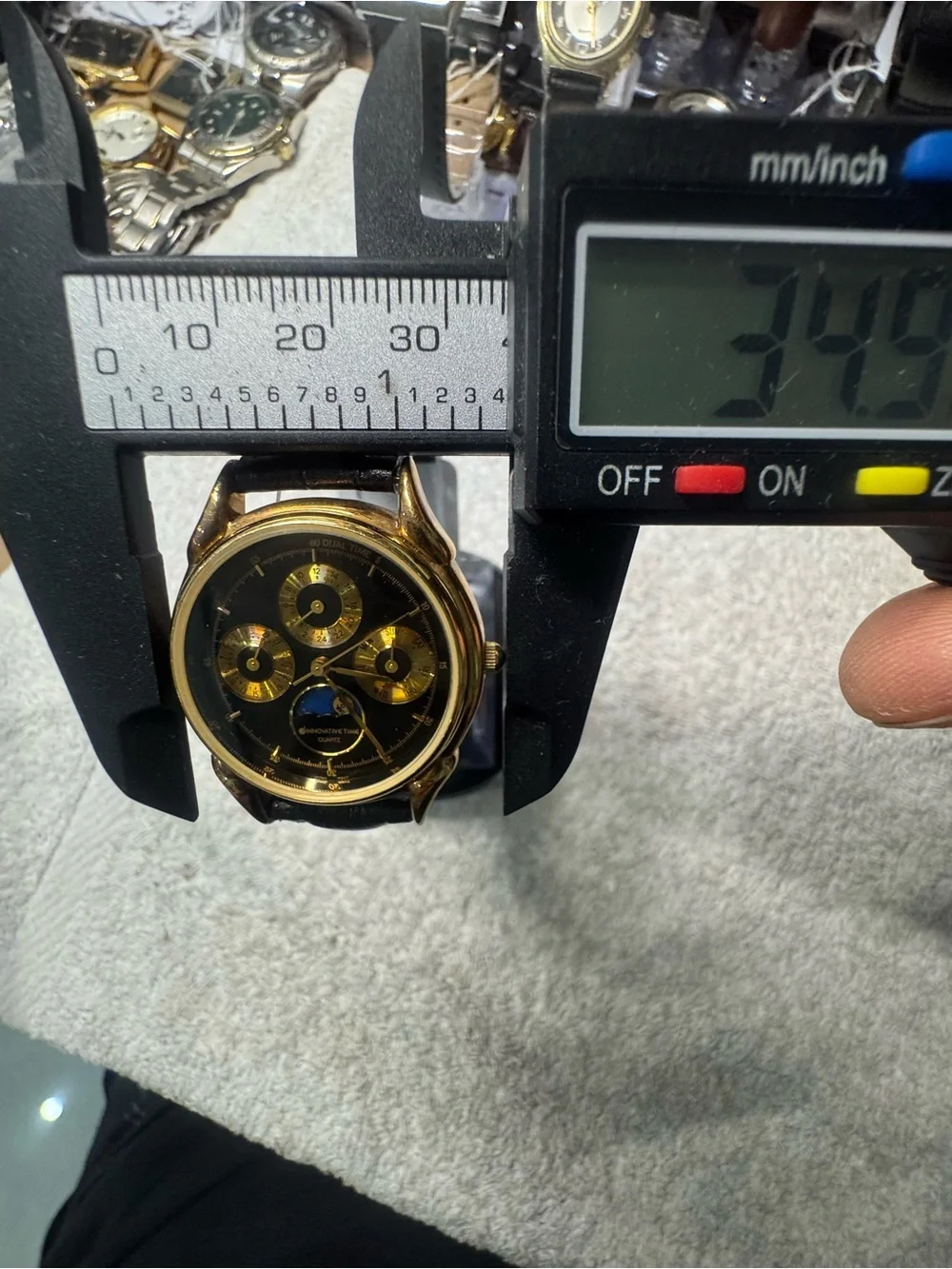 Quartz Men's Gold and Black Multi-Function Watch